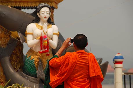 Monk photographing at Sop Ruak