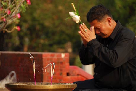 Worshipper at Sukhothai, Thailand